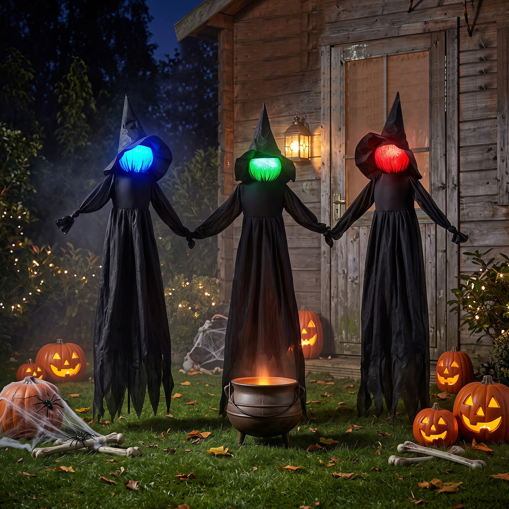 Outdoor Halloween witch decorations with LED lighted faces and faceless design, ideal for spooky yard displays and haunted houses.