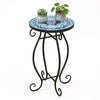 Round accent plant stand with cobalt blue mosaic top and black steel frame, perfect for indoor or outdoor use.