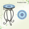Round accent table with a cobalt blue mosaic top and black steel frame, perfect for indoor or outdoor plant display.
