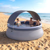 Outdoor inflatable pool with sunshade canopy, designed for 4-6 adults, perfect for backyard parties and summer.