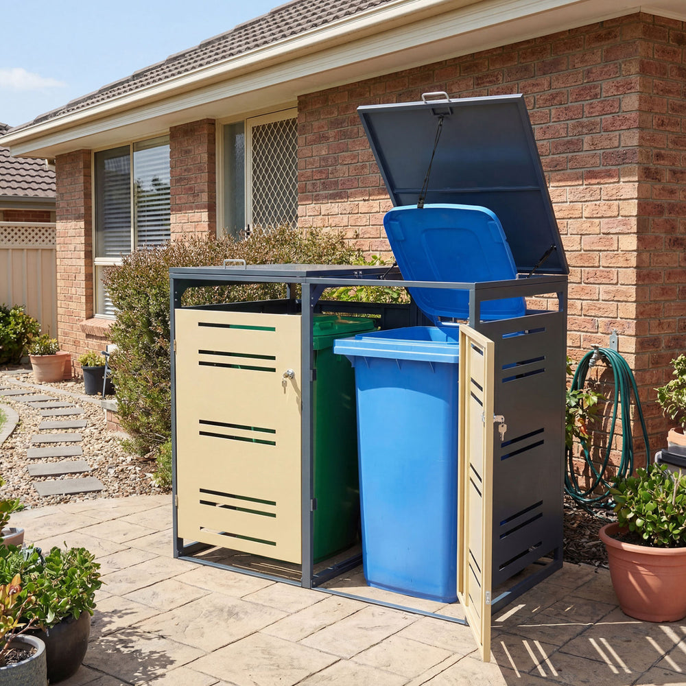 Outdoor metal garbage bin storage shed for 2 trash cans in yellow, featuring gas-strut lids and lockable front doors.