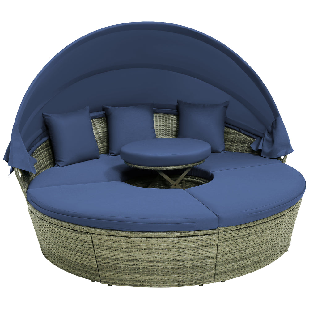 Round outdoor daybed with retractable canopy and navy cushions, featuring hand-woven PE wicker for patio relaxation.