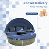 Outdoor PE wicker round daybed with retractable canopy and navy cushions, ideal for backyard or poolside relaxation.