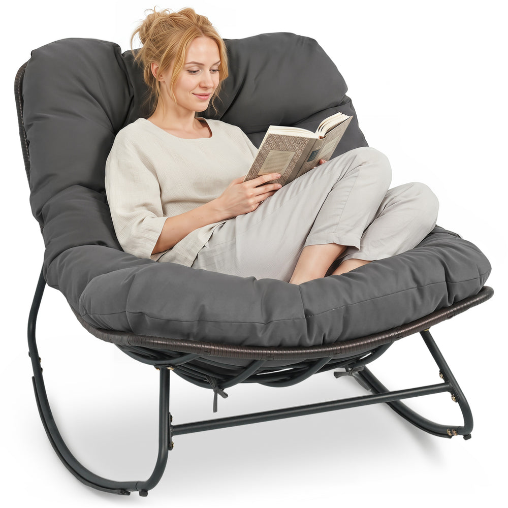 Outdoor Papasan rocking chair in gray with thick cushion, designed for comfort and stability, perfect for relaxation.