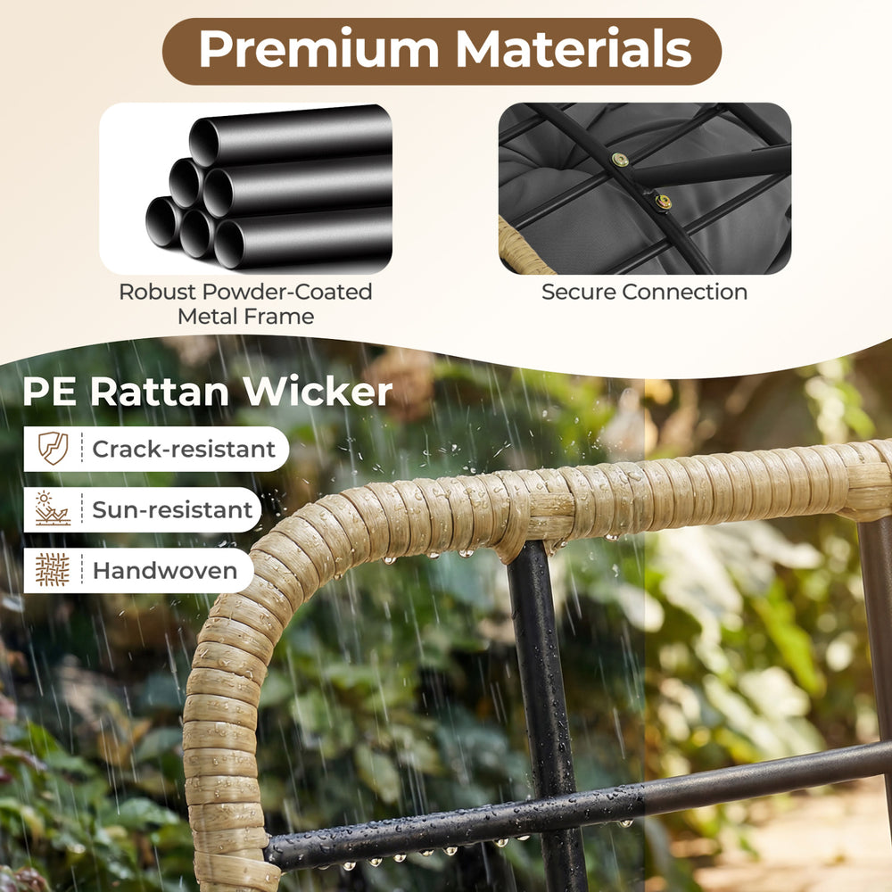 Close-up of the PE rattan wicker and powder-coated metal frame of the outdoor Papasan rocking chair for patio use.