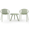 Two green outdoor chairs and a round coffee table from the Outdoor Paradise 7-Piece Patio Relaxation Set, perfect for.