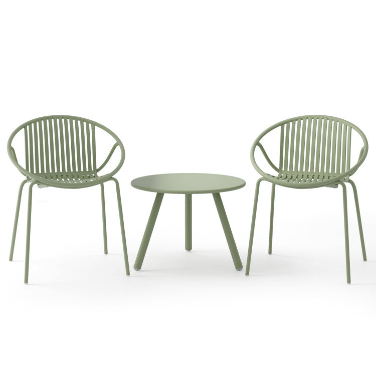 Two green outdoor chairs and a round coffee table from the Outdoor Paradise 7-Piece Patio Relaxation Set, perfect for.