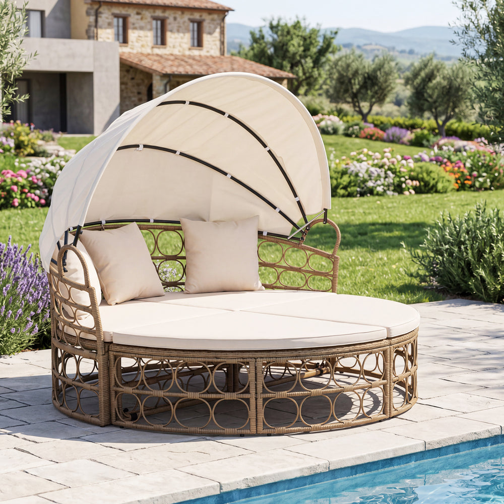 Stylish outdoor patio daybed featuring a retractable canopy and soft cushions, perfect for elegant garden lounging.
