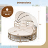 Outdoor patio daybed with retractable canopy, yellow wicker rattan, and comfortable cushions for garden relaxation.
