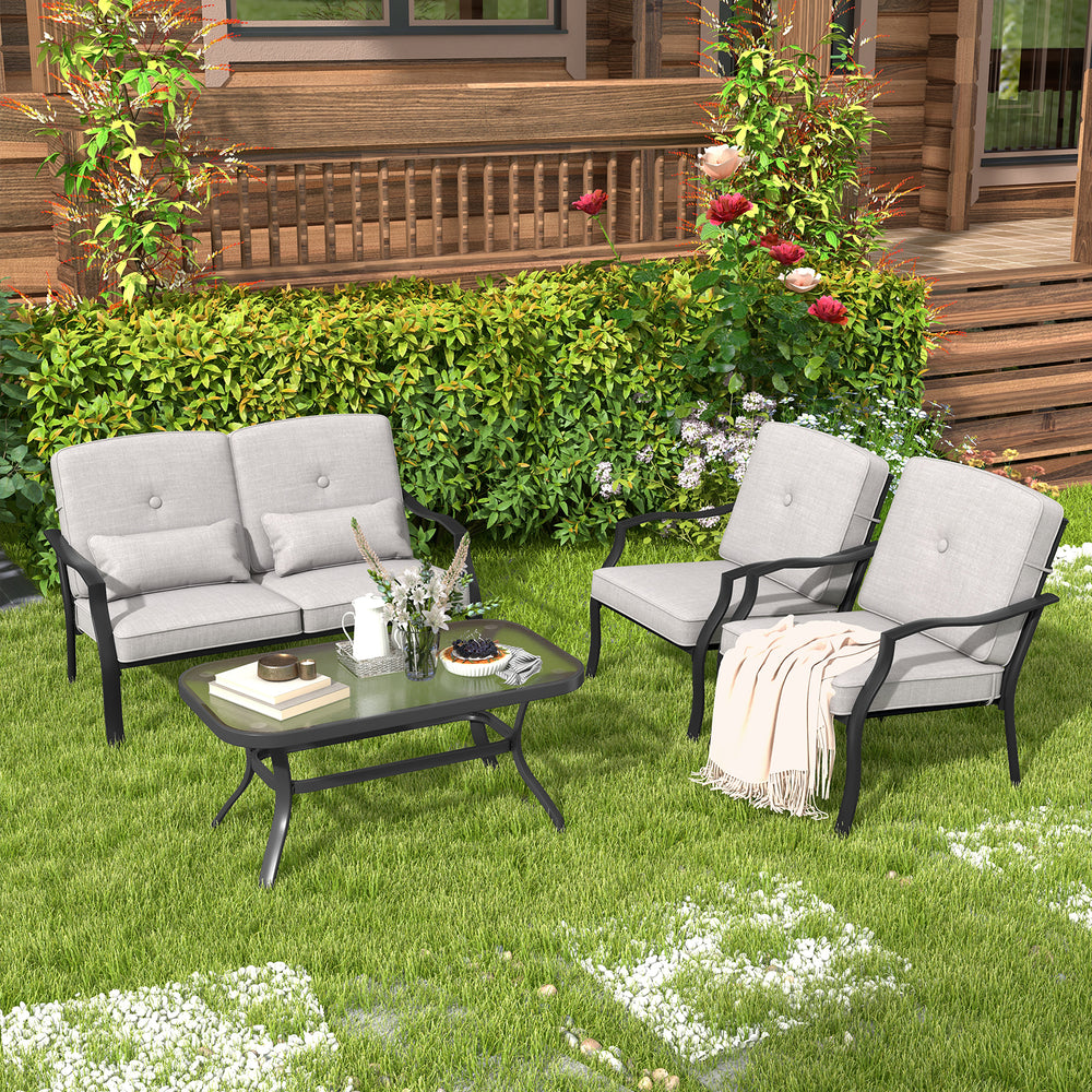 Outdoor conversation set featuring a gray loveseat and two chairs with cushions, complemented by a tempered glass.