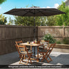 Gray 7.5 feet outdoor patio market umbrella with push button tilt, featuring a sturdy structure and air vent for.