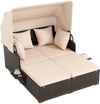 Outdoor patio rattan daybed with retractable canopy, soft cushions, and side tables for backyard relaxation.