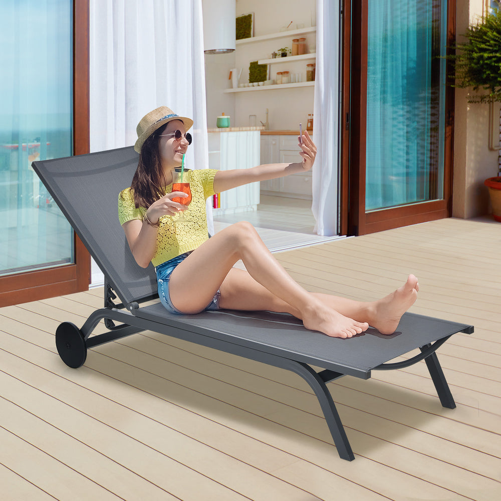 Adjustable gray outdoor patio recliner chair with six positions, perfect for relaxing by the pool or balcony.