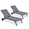 Two gray adjustable outdoor patio recliner chairs with six positions and wheels for easy mobility, perfect for.