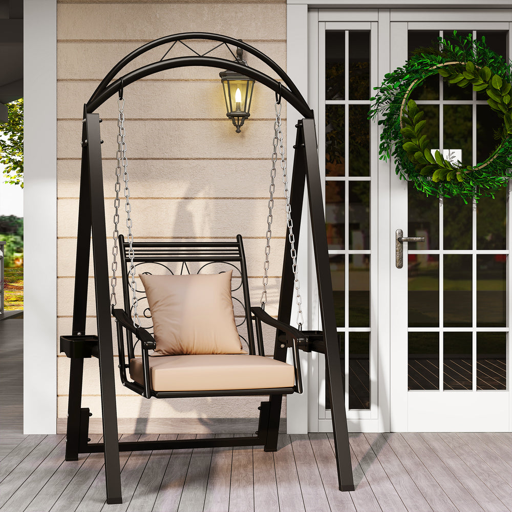 Outdoor porch swing with removable cushions and side tables, featuring a black metal frame and stylish arched top for.