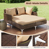 Outdoor rattan double daybed with cozy armrests, brown cushions, and an X-shaped metal frame for poolside relaxation.