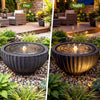 Outdoor round sphere water fountain with LED lights, showcasing a tranquil water flow and realistic stone-like design.
