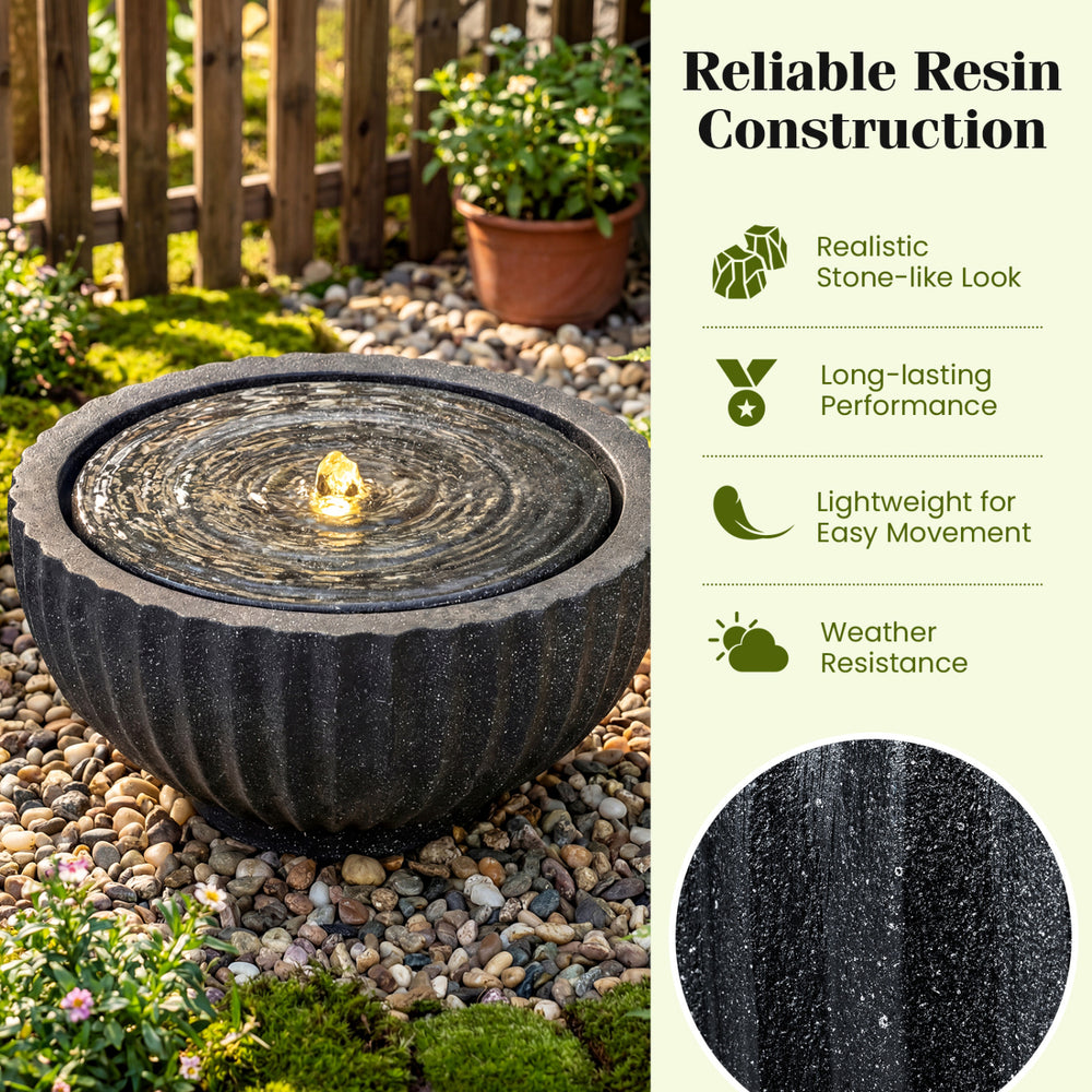 Outdoor round sphere water fountain with LED lights, featuring a realistic stone-like look and lightweight resin.