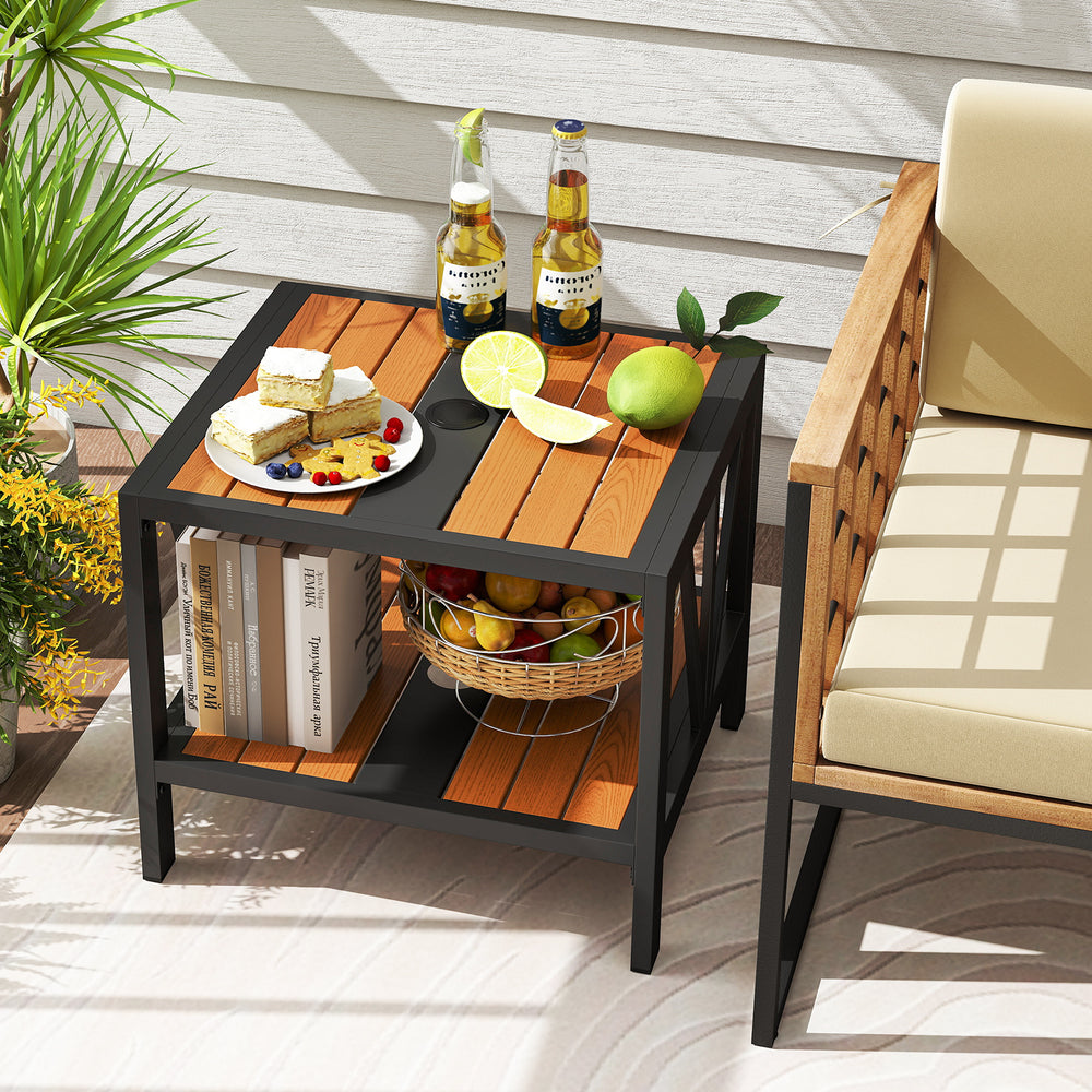 Outdoor side table with umbrella hole and storage shelf, featuring a wood-like surface, perfect for porch or patio use.