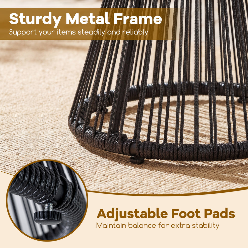 Close-up of the sturdy metal frame and adjustable foot pads of the black outdoor side table with tempered glass top.