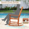 Solid wood outdoor rocking chair with high backrest, slatted seat, and anti-rollover devices for secure relaxation.