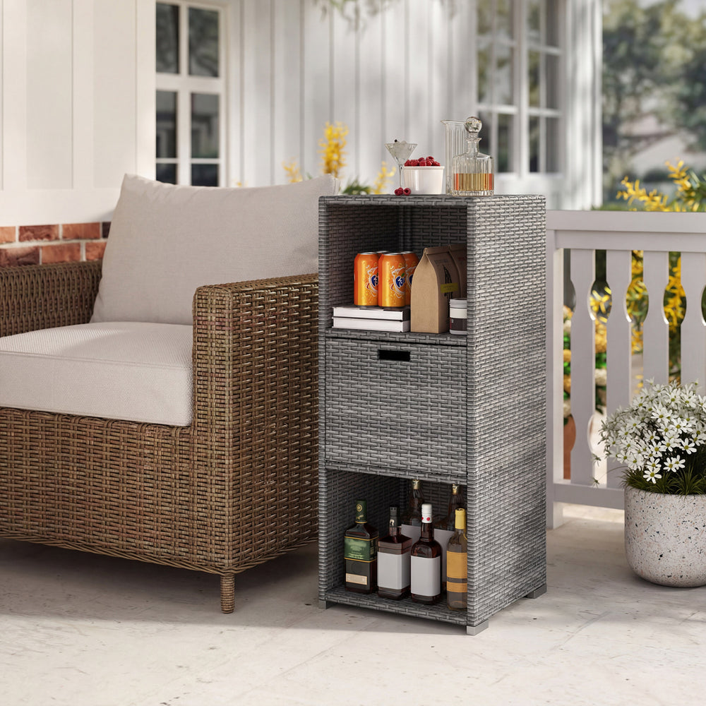 Gray outdoor storage cabinet with a countertop and removable drawer, ideal for organizing drinks and essentials on the.