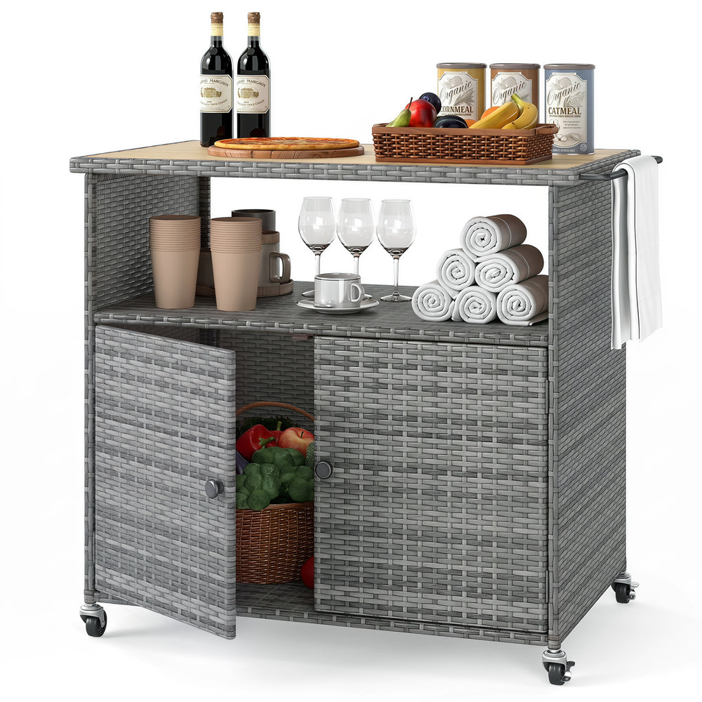 Outdoor storage cabinet with a sturdy acacia wood top and lockable wheels, ideal for organizing patio items.