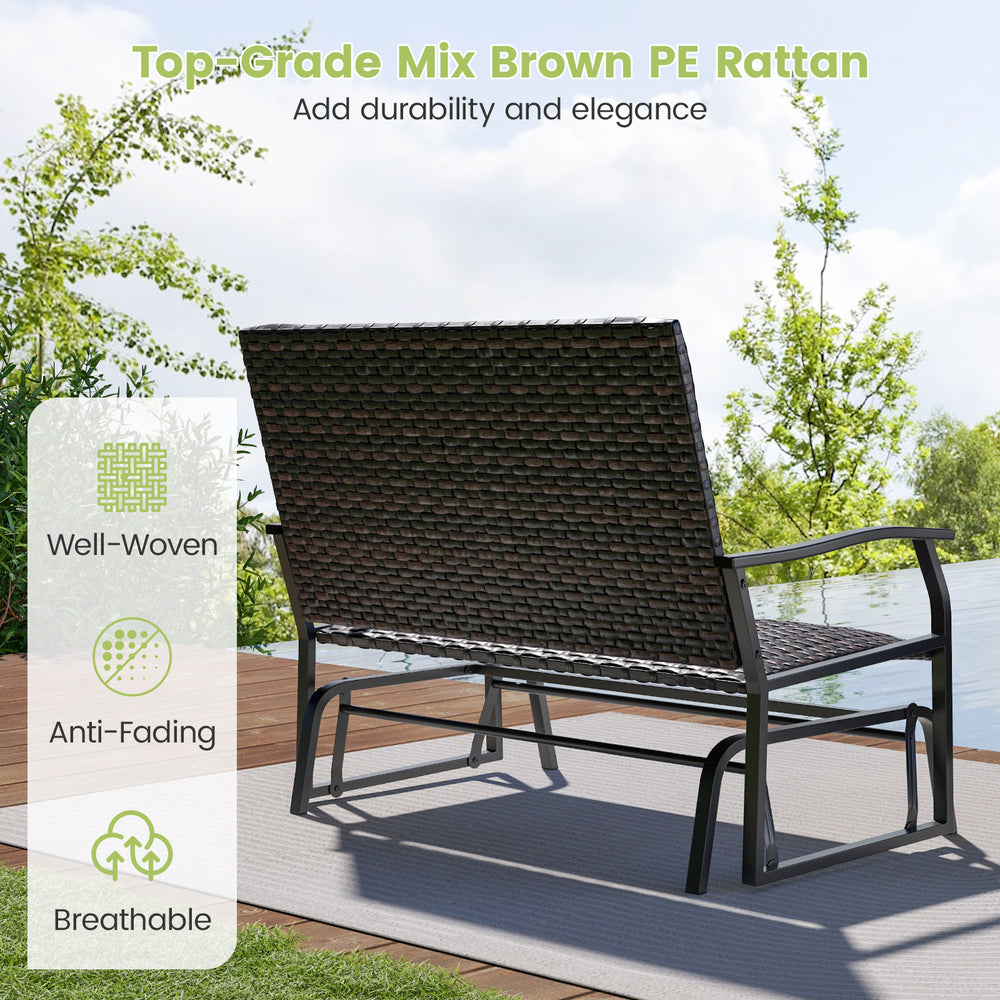 Two-person swing glider bench in brown PE rattan with quick dry foam seat, perfect for backyard relaxation.