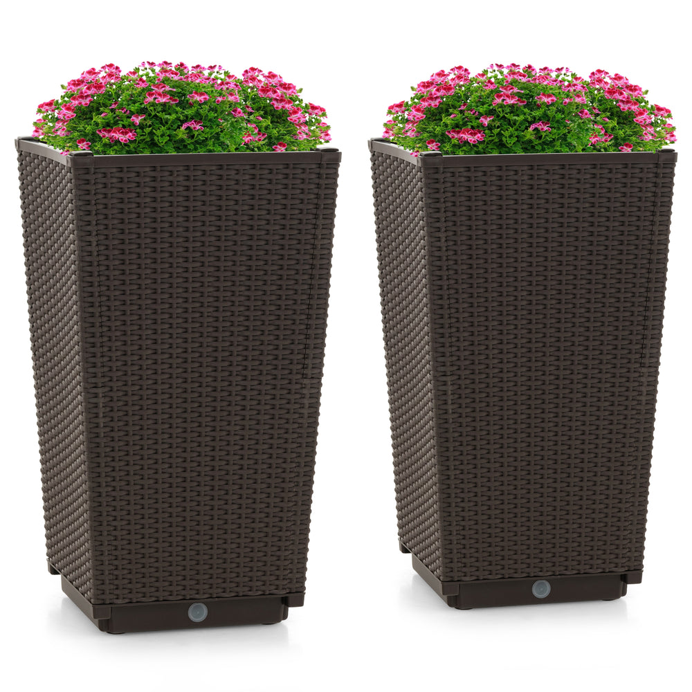 Set of 2 brown wicker flower pots with drainage holes, ideal for porch or balcony decoration and plant cultivation.