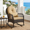 Brown outdoor wicker rocking chair with anti-tip stoppers, featuring thick cushions for comfort on a patio or porch.