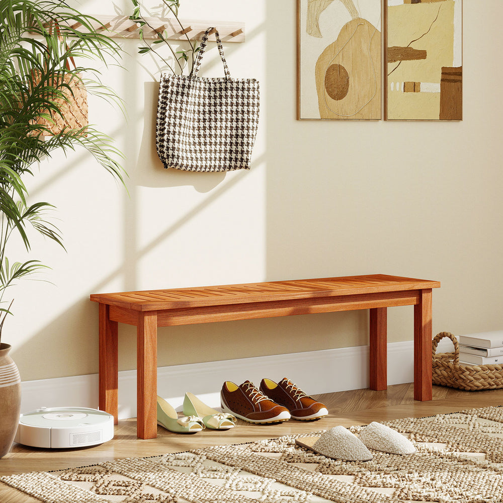 Backless outdoor wood bench providing a smooth, splinter-free surface, ideal for entryway use or garden decor.