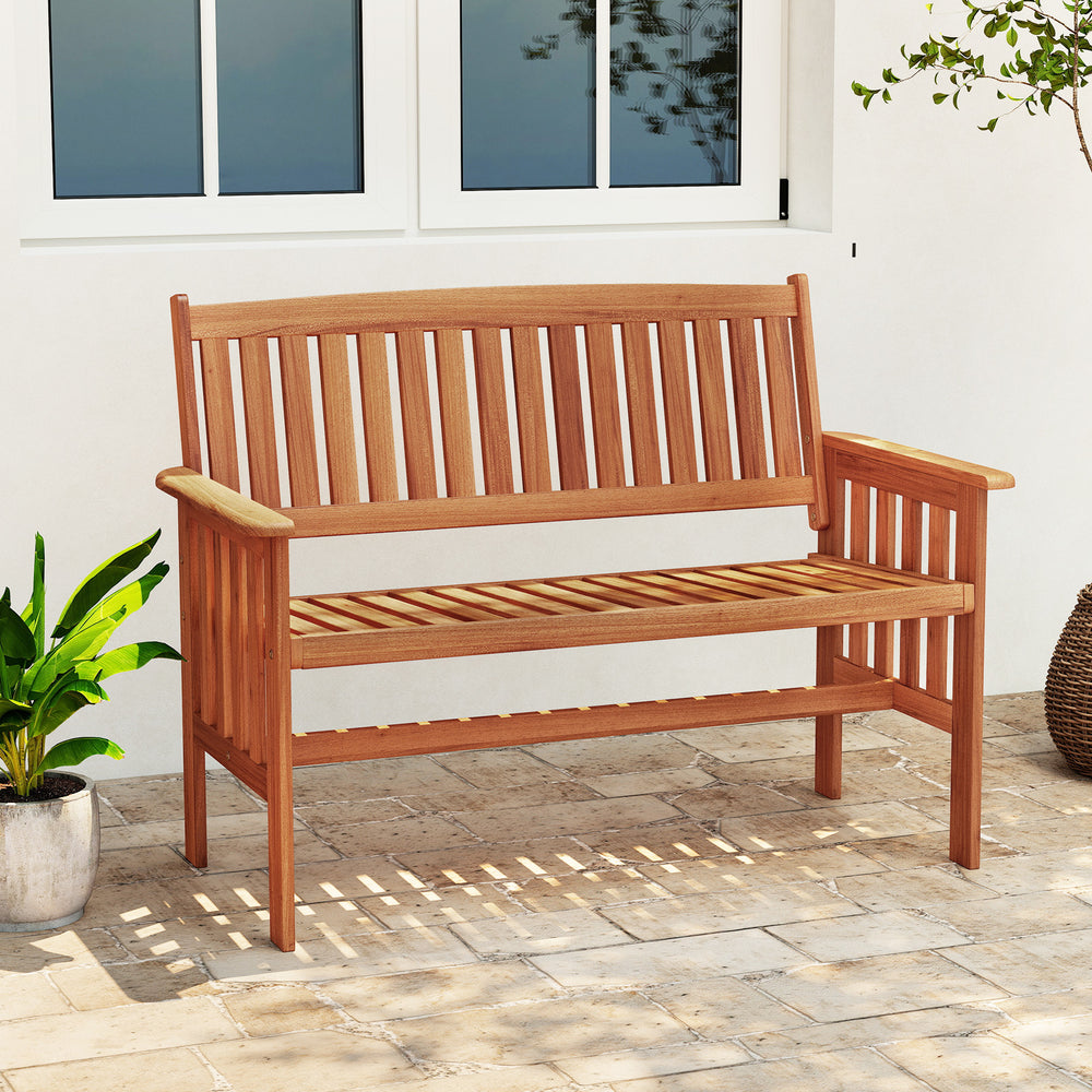 Two-person outdoor wood garden bench with slatted seat and armrests, perfect for patio or garden relaxation.