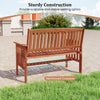 Outdoor wood garden bench with slatted seat, reinforced crossbar, and ergonomic design for patio or garden relaxation.