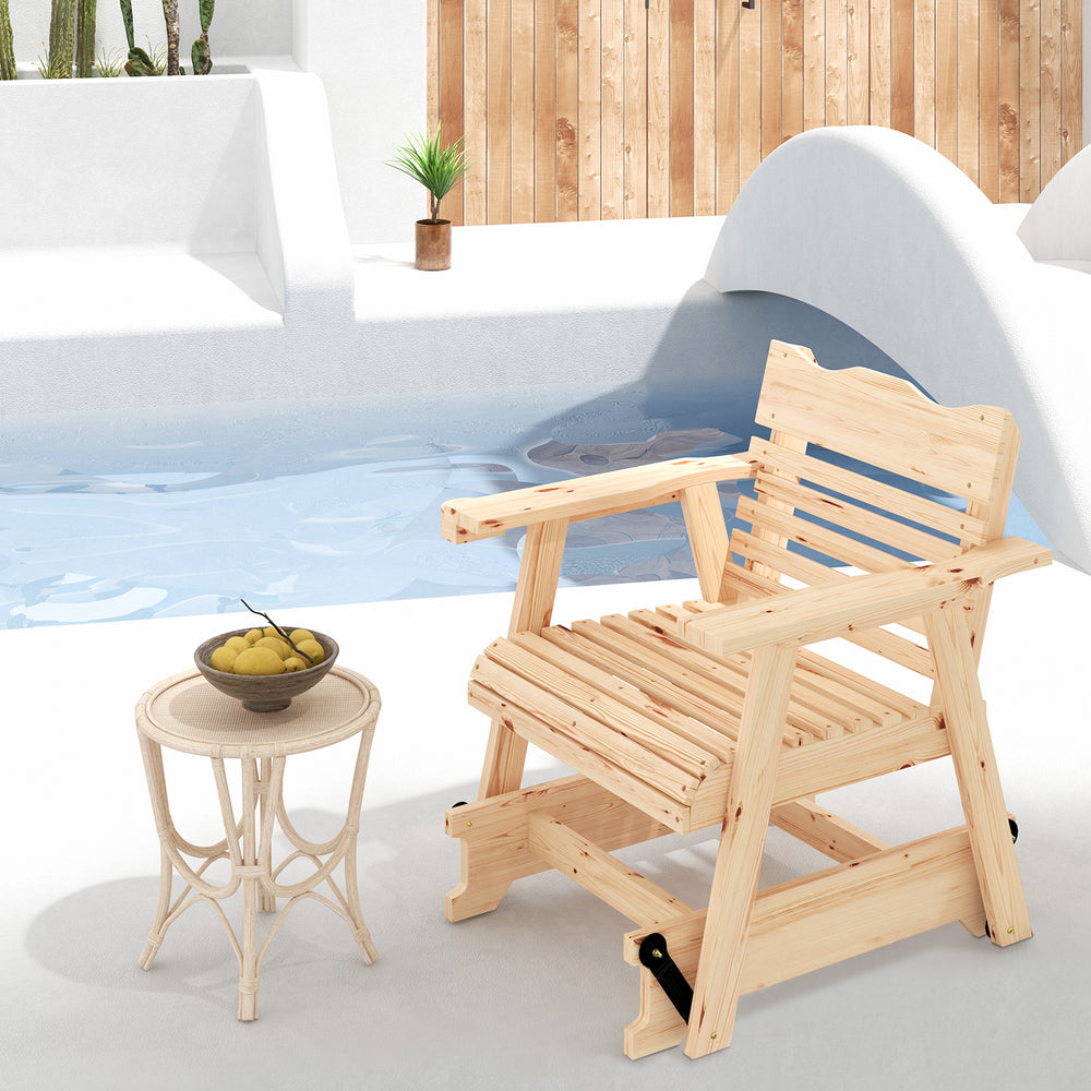 Outdoor wood rocking chair with high back and widened armrests, placed poolside for a rustic touch and comfort.
