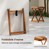 Foldable outdoor wood tray table with supportive webbing, perfect for easy storage and serving in patio or garden.