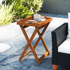 Portable outdoor wood tray table with folding frame, featuring a natural finish and side cut-out handles for easy.