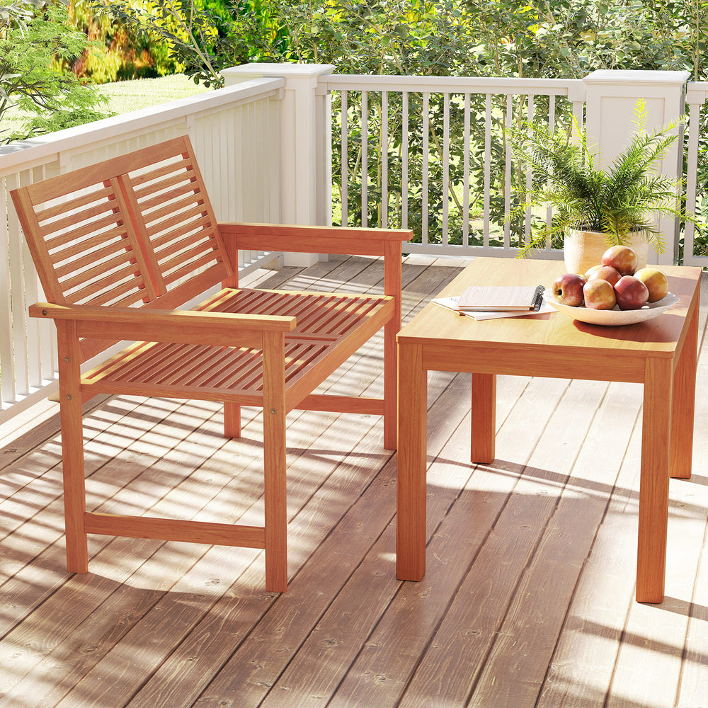 Two-person outdoor wooden bench with slatted backrest, ideal for patio relaxation and enjoying nature.