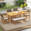 Outdoor wooden dining chair set with armrests and curved back, featuring padded cushions for comfort in garden settings.