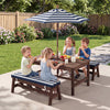 Kids enjoying snacks at the Outdoor Wooden Picnic Table with removable umbrella and blue cushions in a garden setting.