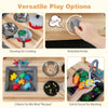 Wooden outdoor mud kitchen for kids featuring stovetop, sink, faucet, and storage for imaginative play and creativity.