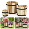 Close-up of the outdoor wooden planter box with smooth acacia wood finish and reinforced metal bands, ideal for garden.