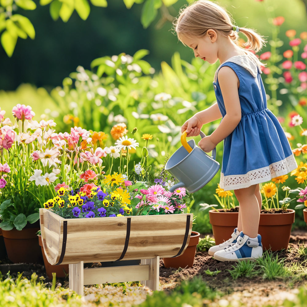 Outdoor wooden planter with legs, crafted from acacia wood, featuring a half whiskey barrel shape, perfect for flowers.