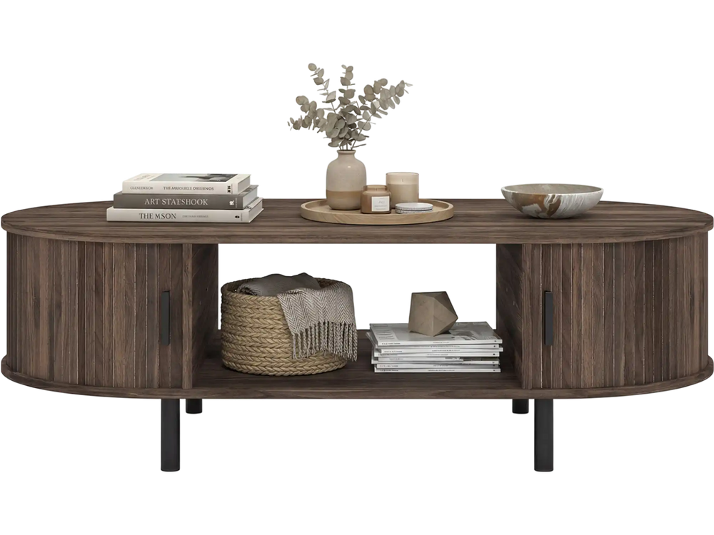 Oval coffee table with walnut finish, featuring dual sliding doors and open shelves for stylish living room storage.