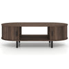Oval coffee table with walnut finish, featuring dual side shelves and fluted door accents for stylish living room.