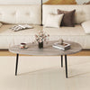 Oval gray coffee table with sturdy metal legs, perfect for living room use and stylish organization of decor and.