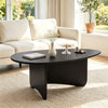 Spacious black oval coffee table with rounded corners and T-shaped base, perfect for low-profile lounging and easy cleaning.