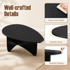 Oval black coffee table with a thickened 0.7" tabletop and rounded corners, perfect for low-profile lounging.
