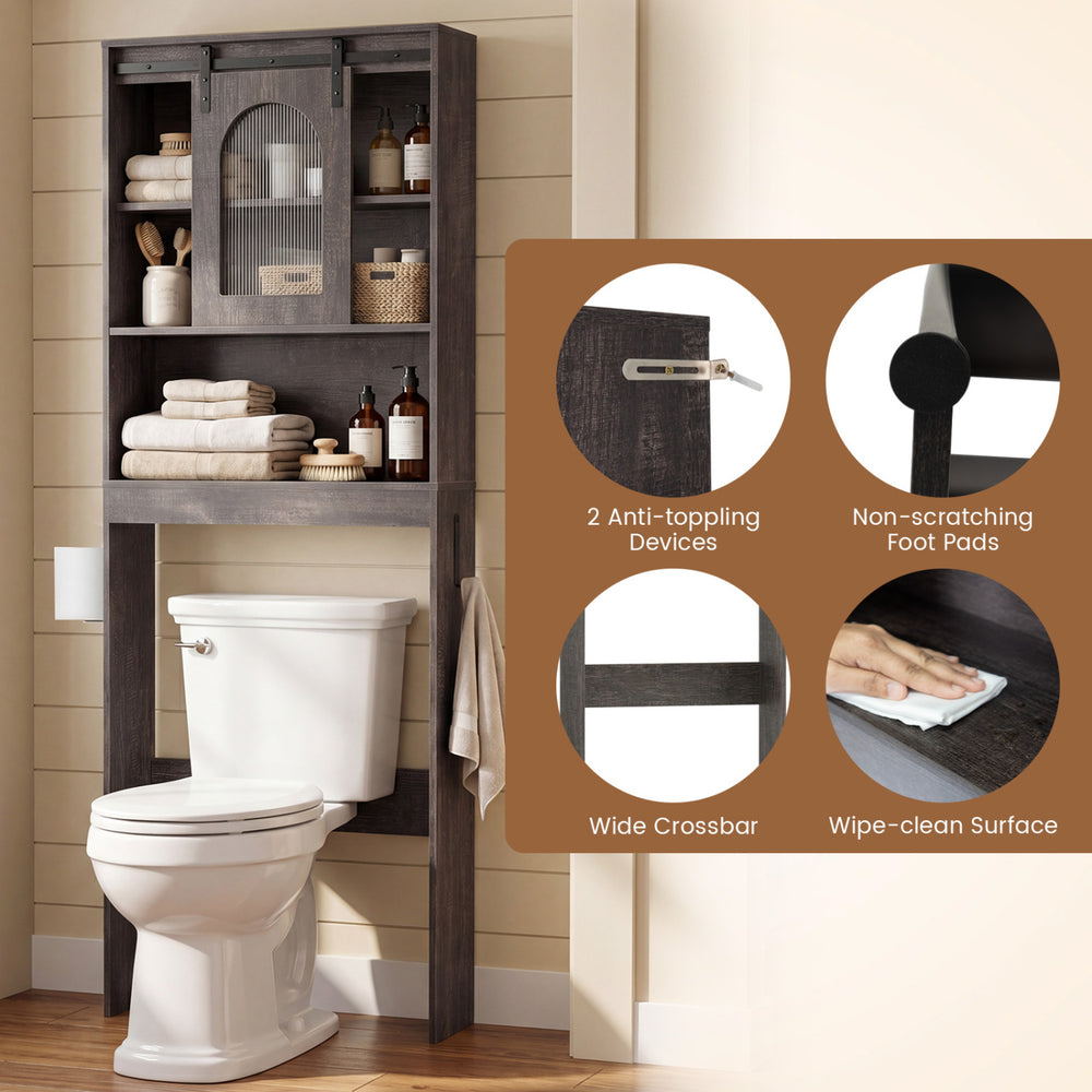 Over toilet storage cabinet with sliding barn door, open shelves, and protective foot pads for stylish bathroom.