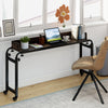Overbed desk with wheels in brown, featuring adjustable height and a large tabletop for versatile use by the bed.