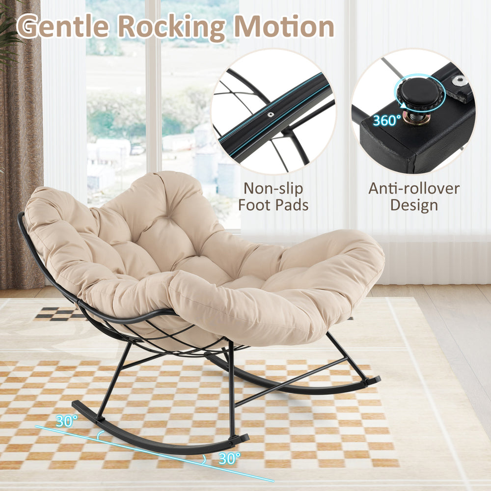 Oversized beige egg papasan chair with padded cushion, featuring gentle rocking motion and non-slip foot pads for.